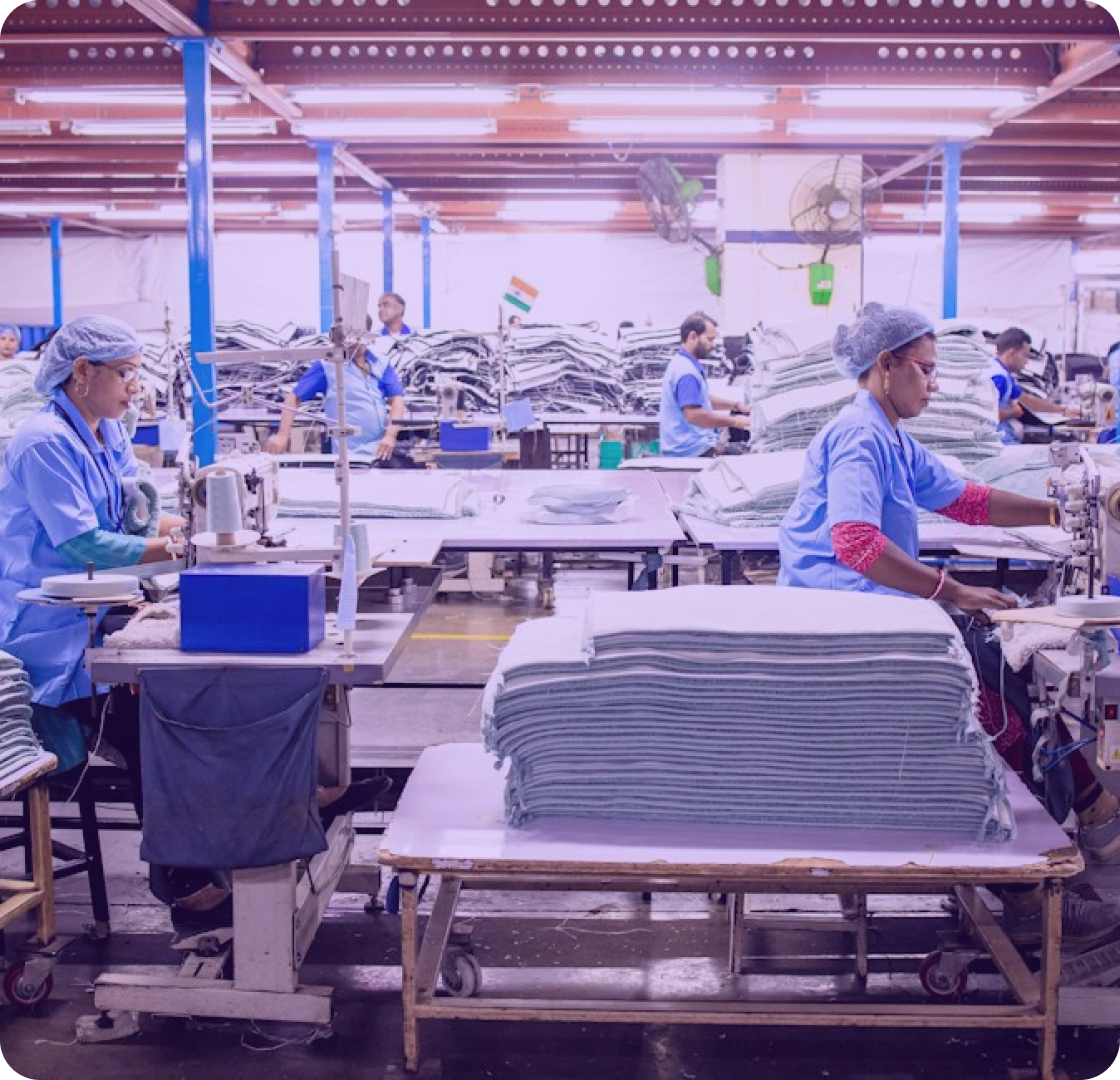 Machinists at work in a fair-wage garment facility in the Purl Studios network